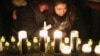 CANADA -- Mourners attend an outdoor vigil for the victims of a Ukrainian passenger jet which crashed in Iran, in Toronto, Ontario, Canada January 9, 2020. 